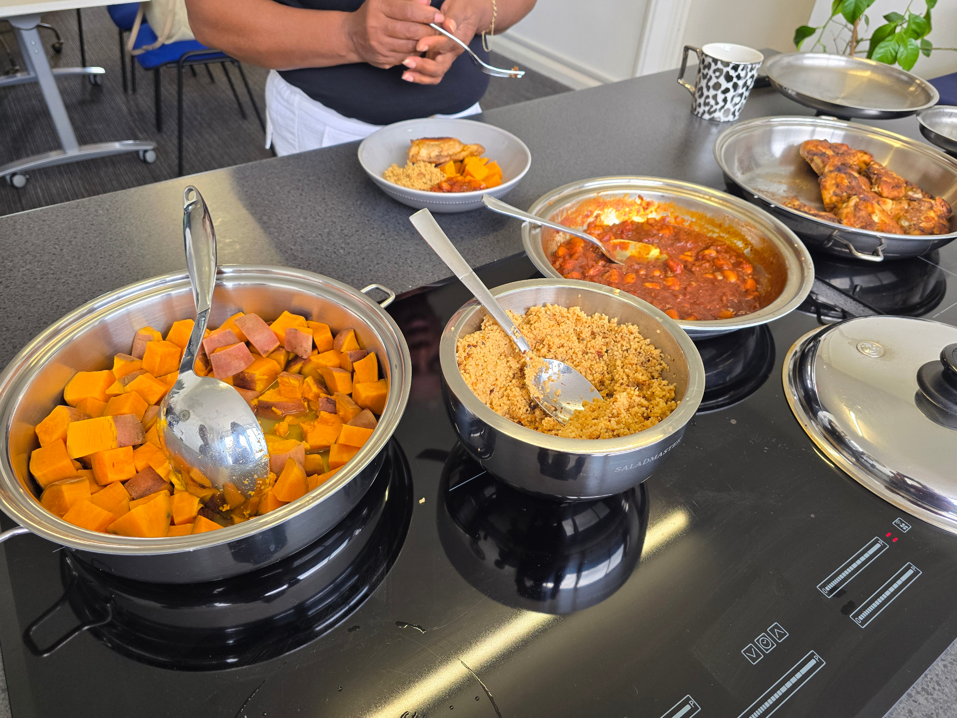 Saladmaster cooked buffet — sweet potato, couscous, chicken stew