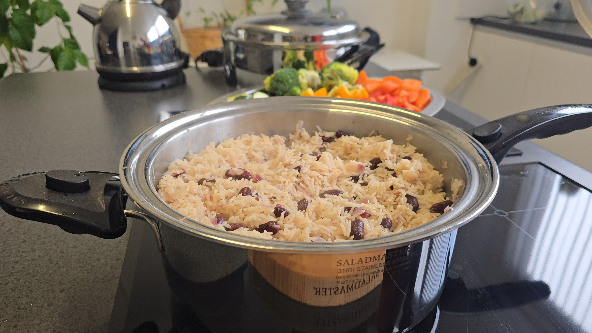 Rice and beans cooking in a Saladmaster pan on the hob